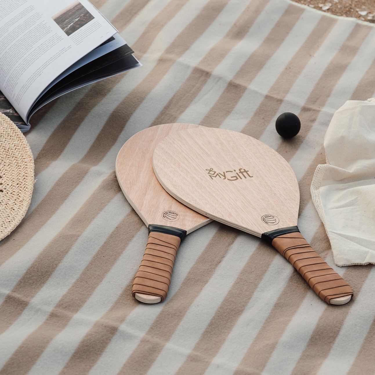 Un jeux de goodies raquette de plage en bois